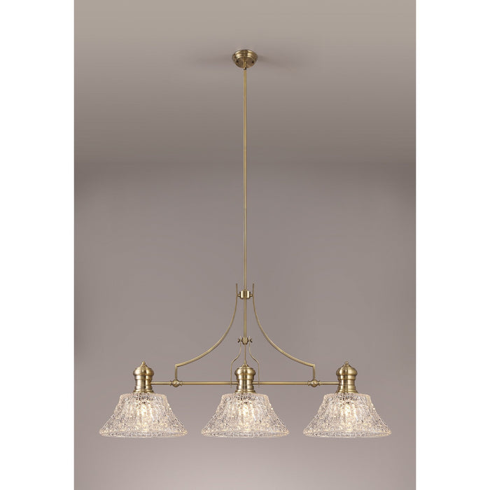 Nelson Lighting NLK04749 Louis Linear Pendant With 38cm Patterned Round Shade Antique Brass/Clear Glass